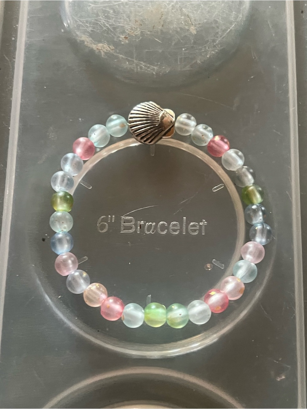 Multicolor Glass Bead Stretch Bracelet with Shell Accent